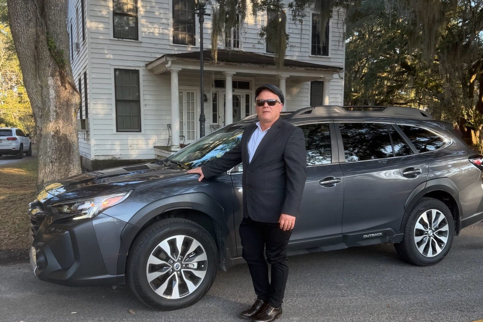 Joe with His Subaru Outback